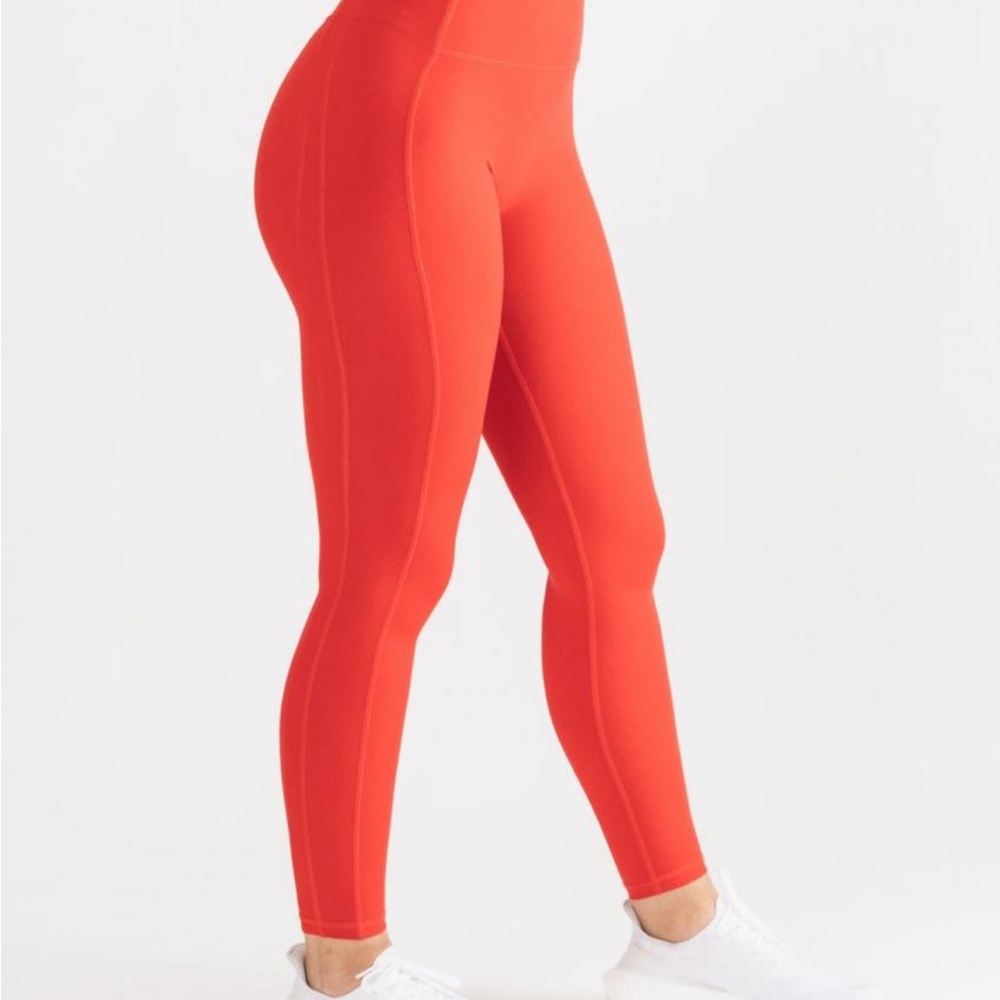 Alphalete Pulse Kinetic Leggings in Bright Coral Pink